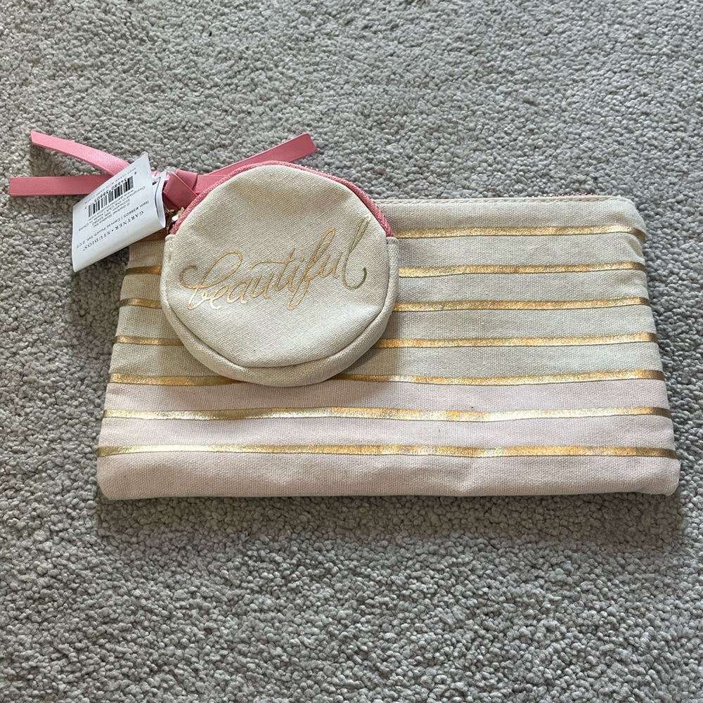 Gartner Studios Canvas Pouch Set
Beige w/ gold stripes. Item #38605